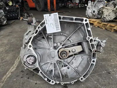 Used Honda Civic 6-speed manual transmission with inspection tag