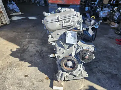 Used Toyota Corolla 1.8L 2ZR-FE engine long block on the shop floor