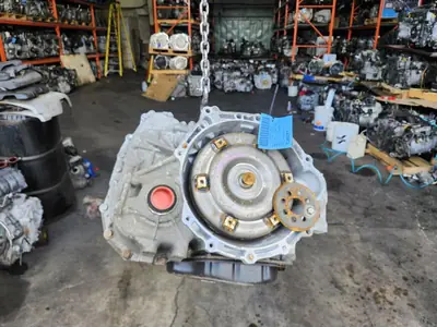 Used Toyota Corolla 1.8L CVT transmission in a used auto parts warehouse